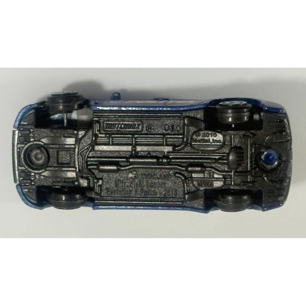 MATCHBOX 2010 BLUE MITSUBISHI EVOLUTION X POLICE 1:62 DIE-CAST TOY CAR MATTEL‎